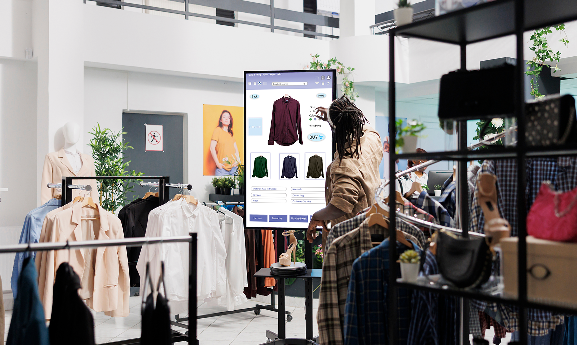 Shopify clothing store interior with self-service checkout kiosk